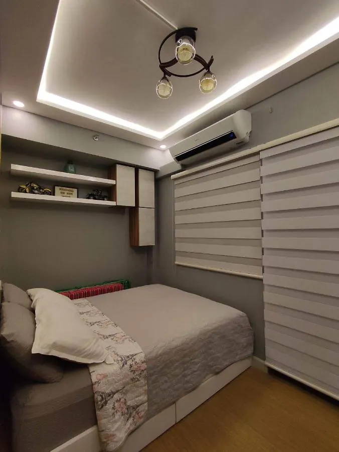 טאגיג Maicozy Condo מלון דירות